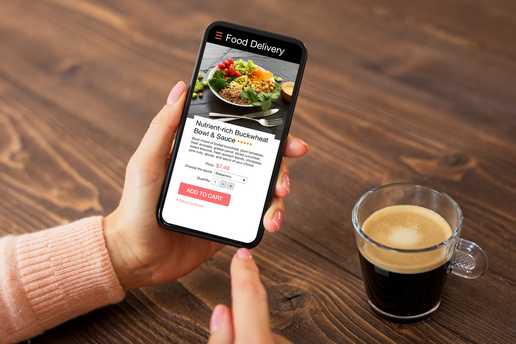 Woman Ordering Meal Online Using Food Delivery App